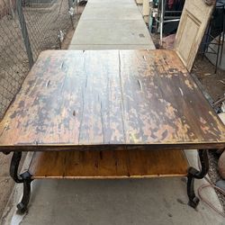 Up cycled-distressed   wood coffee and iron coffee table
