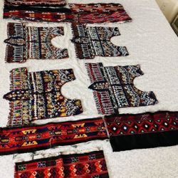 Afghan traditional Tunics Each  $50.