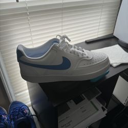 Blue Nike Sign 