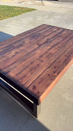 Wood coffee table with metal legs