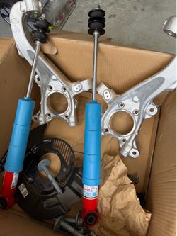 OEM Toyota/Bilstein suspension components with aluminum knuckles/spindles and shocks/struts