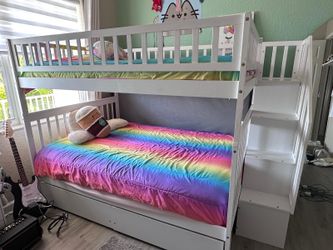 Full size bunk bed , hardly ever  used top mattress included asking $300,00 or best offer.