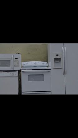 White side by side kitchen appliance set