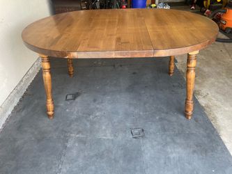 Wooden Table with extenders and 4 chairs
