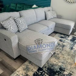 GREY SECTIONAL / SLEEPER W/ CUP HOLDER