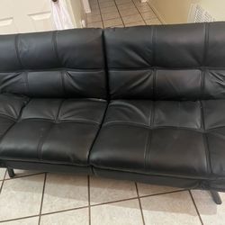 Futon, leather dual reclining