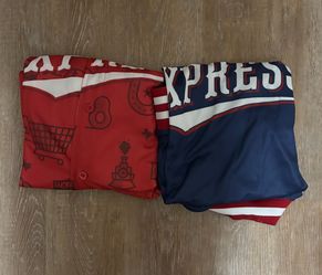 Two XL Round Rock express shirts (blue and red)
