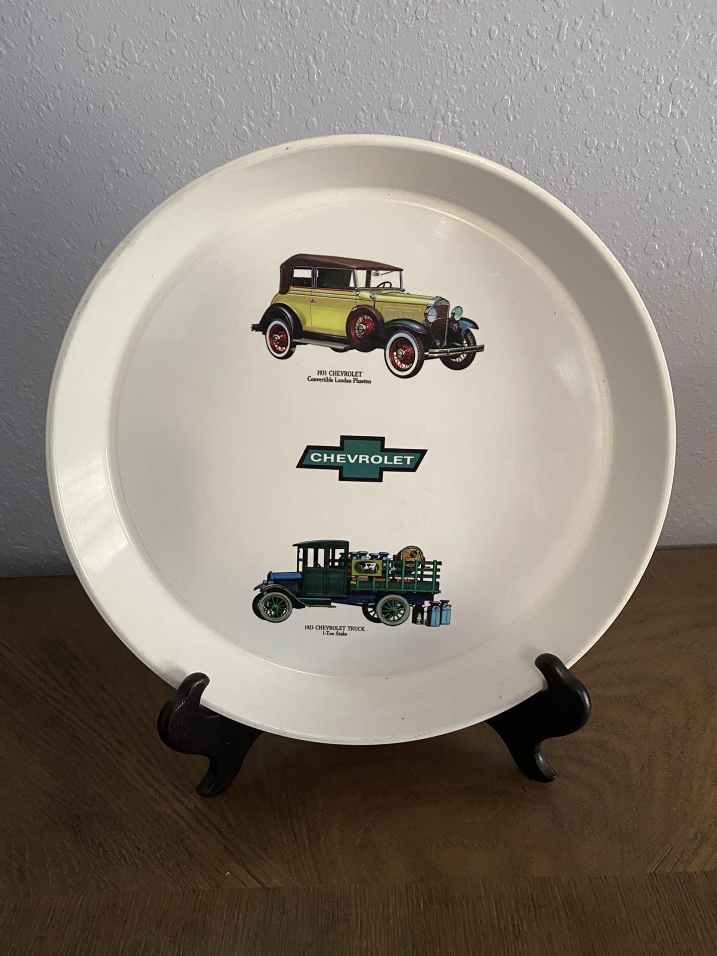 Vtg Americana Chevrolet Round Serving Tray 1923 1-ton Stake Truck & 1931 Convertible Landau Phaeton Pictured. W Chevrolet in middle. Condition is Use