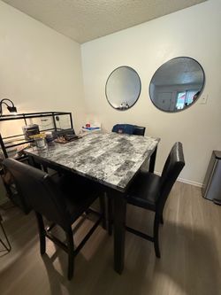 Black marble dining room table