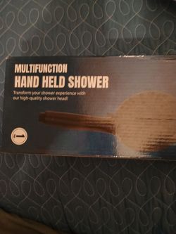 HAND HELD SHOWER.