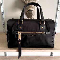 Women’s Marc Jacobs handbag black with gold trims. Retail $360. Great condition! Clean interior, exterior. 