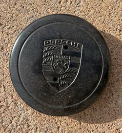 70mm Porsche center cap, original equipment manufacturer.