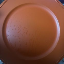 40 Orange charger Plates … plastic stuck to plates so middle is a little messed would be cover with a plate $30