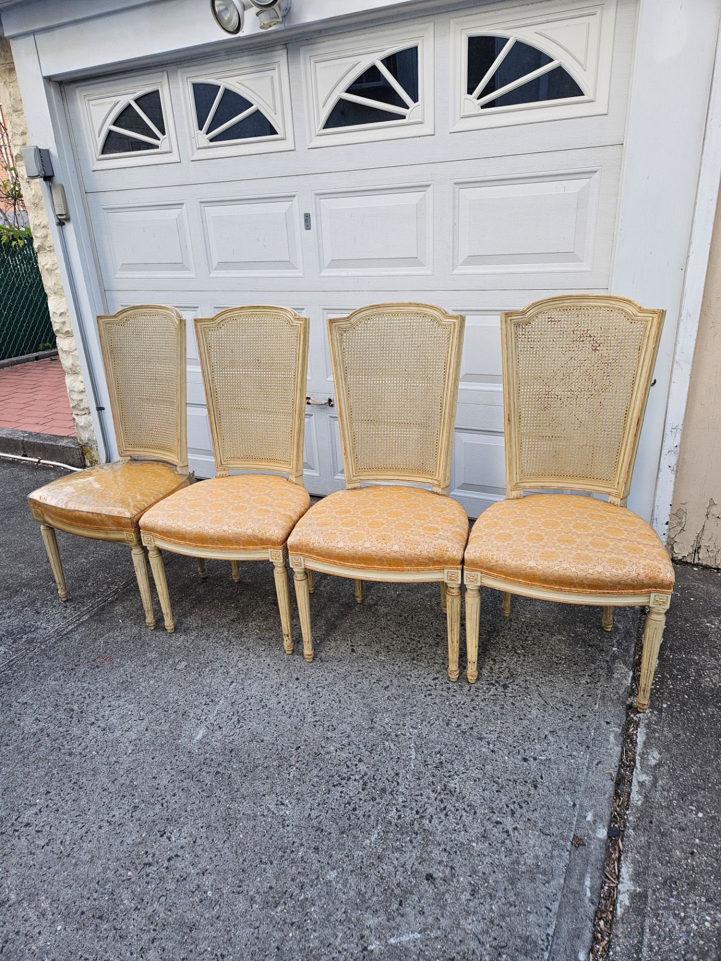 4 vintage cane back chairs
