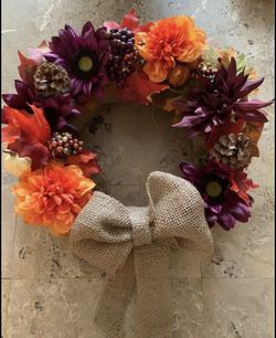 14” fall wreath with vibrant colors and burlap bow.
