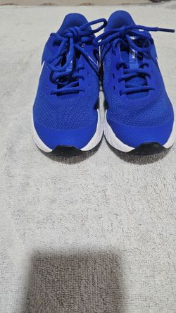 blue Nike Revolution sneakers