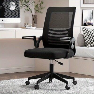 ergonomic or task chair, commonly used in offices or home workspaces