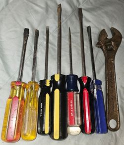 Screwdrivers and 1 wrench