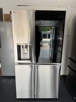 27 cu. ft. Side-By-Side Refrigerator with Instaview Glass, Craft Ice, and Recessed Handles in PrintProof Stainless Steel
