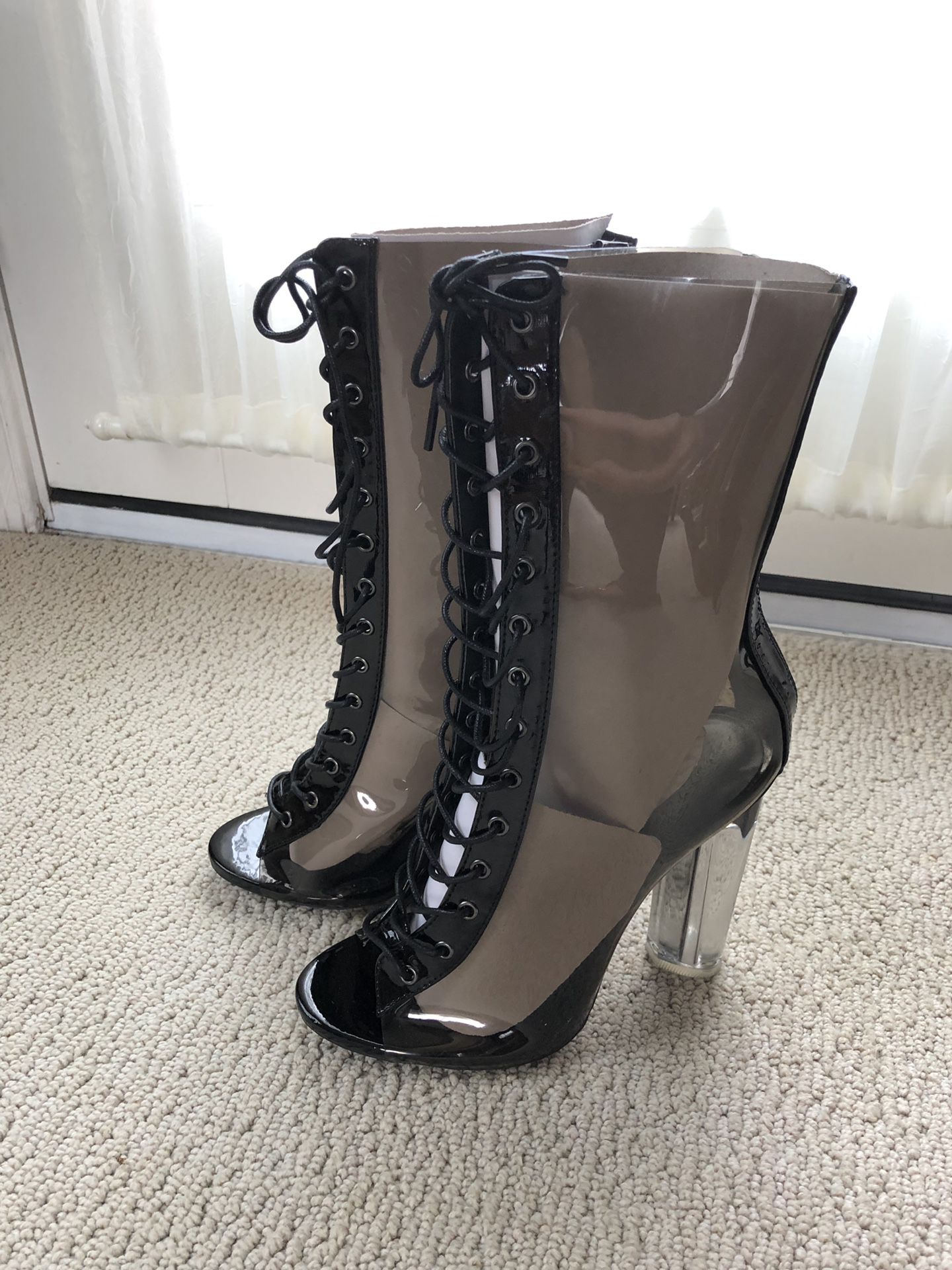 Size 7 booties, brand new, 4” tall acrylic heel