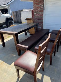 Old sturdy dining table and chairs and bench