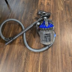 DYSON DC23 BLUE TURBINE HEAD BAGLESS RETRACTABLE CORD CANNISTER VACUUM