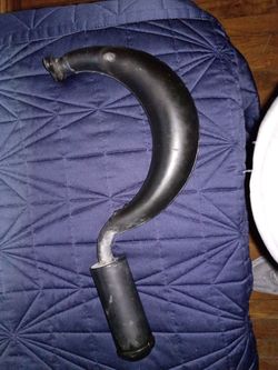 Muffler with expansion chamber and silencer