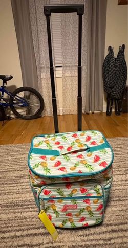 Rolling cooler and picnic blanket