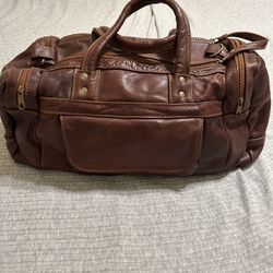 100% leather suitcase
