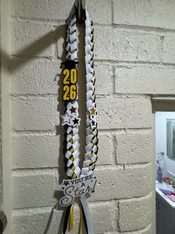 Graduation leis black white & yellow.