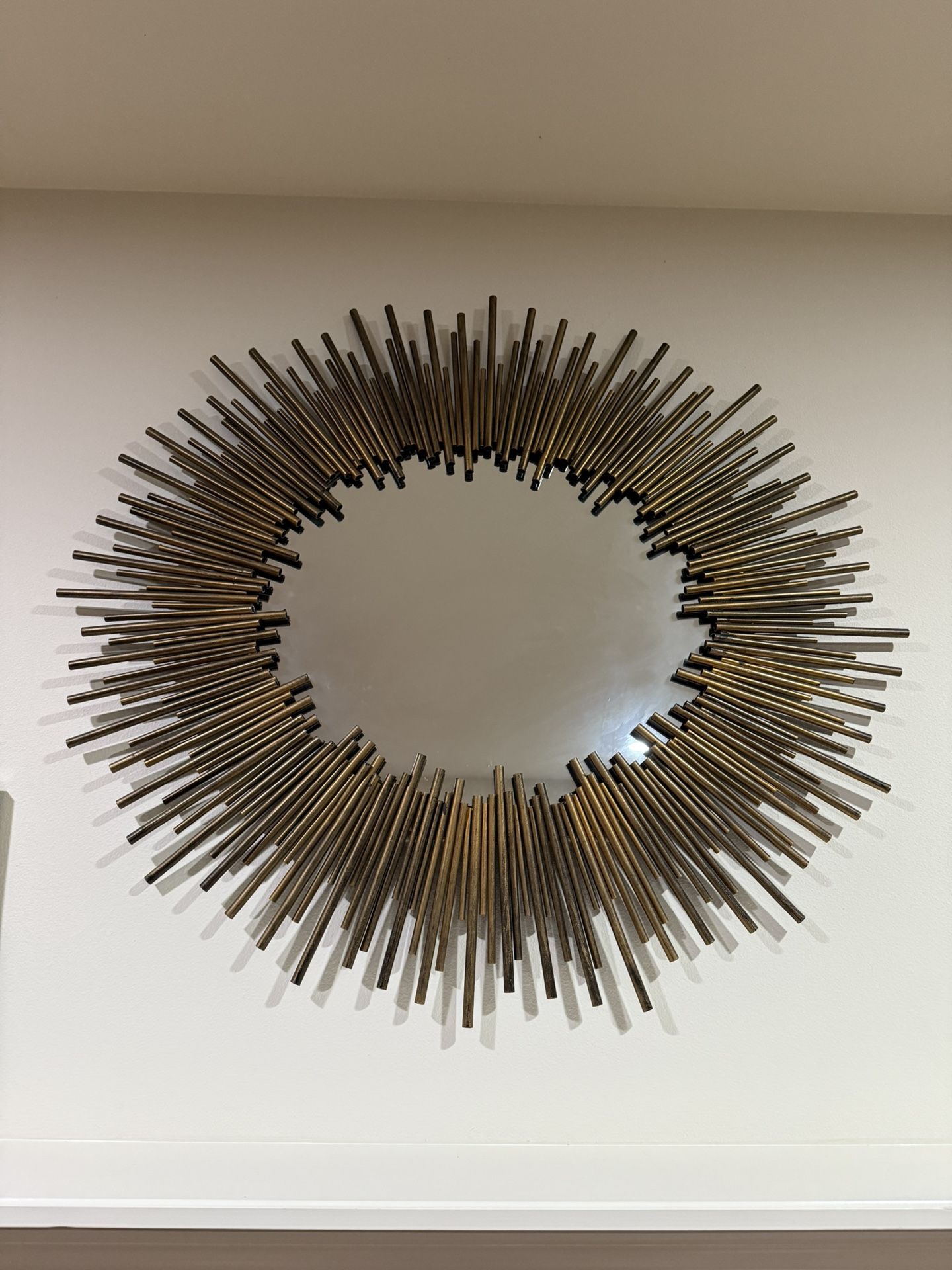 Antique starburst oval mirror