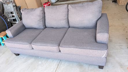 Sleeper sofa with mattress, rarely used.