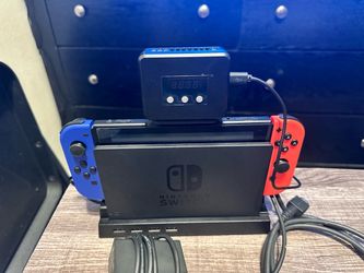 Nintendo Switch BUNDLE w/ 4 USB base , two joycon switch one controllers , 256 GB SD Card storage , switch fan , official Nintendo brand carry case