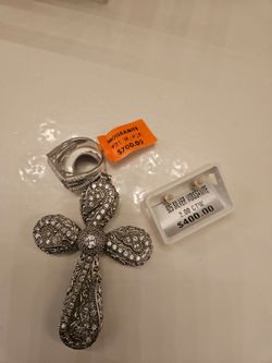Ring earrings and a cross