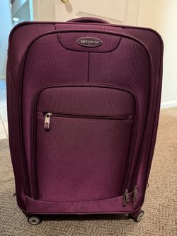 Used Purple Samsonite Luggage 