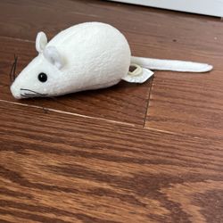White, plush toy mouse with a pull cord mechanism Moves Across The Floor Giftco