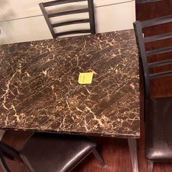 Table And 4 Chairs