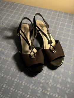 Elegant black Marella sandals with decorative straps.