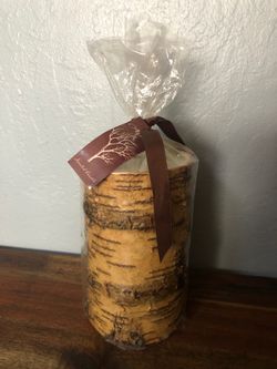 Aspen pillar candle in decorative wrap