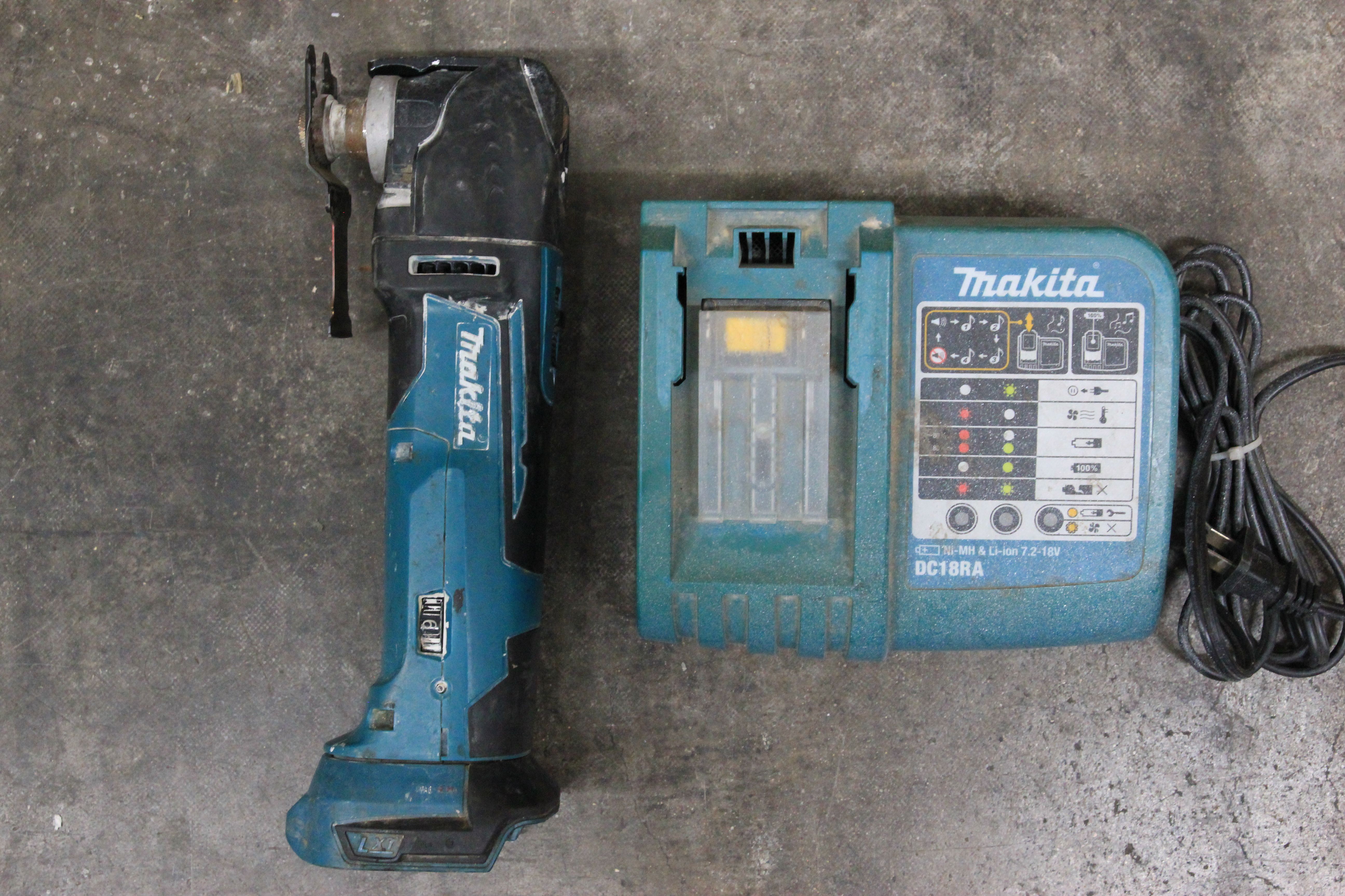 Makita Oscillating Multitool - XMT03 With Charger/No Battery