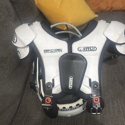 Football shoulder pads and helmets