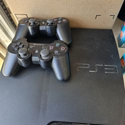 PS3 With 2 Controllers And 10 Games!