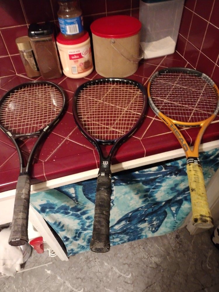 I HAVE 3 NICE TENNIS RACKETS AND CARRYING BAG