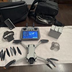 DJI Mini 4 Pro Camera Drone (with RC 2 Remote)