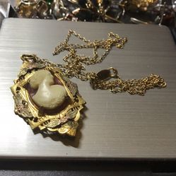 8k Gold With Beautiful carved shell Cameo pendant on chain, signed ALLCO.  Measures 1 5/8” inches tall x 7/8” wide on 19” chain. 