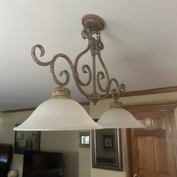 Designers Fountain Mendocino 3-Light Forged Sienna Kitchen Island Light, featuring a rustic bronze finish and cone-shaped alabaster glass shades. 