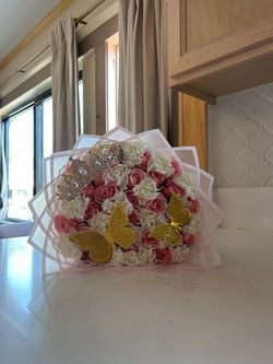 25 roses with carnation + plus add ons 🤍