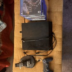 Used PS4 With Assortment Of Games 