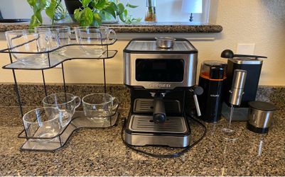 Espresso machine with everything needed to make an espresso