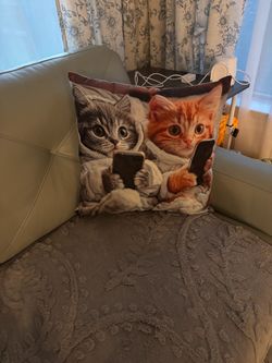 Who has the remote pillow